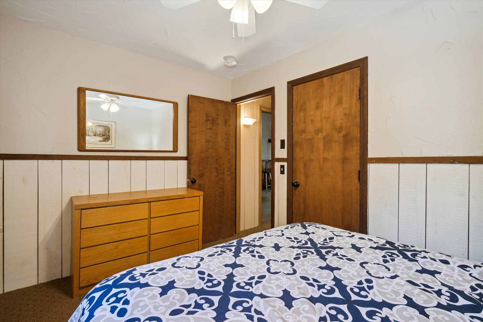 Master bedroom on upper level with queen bed