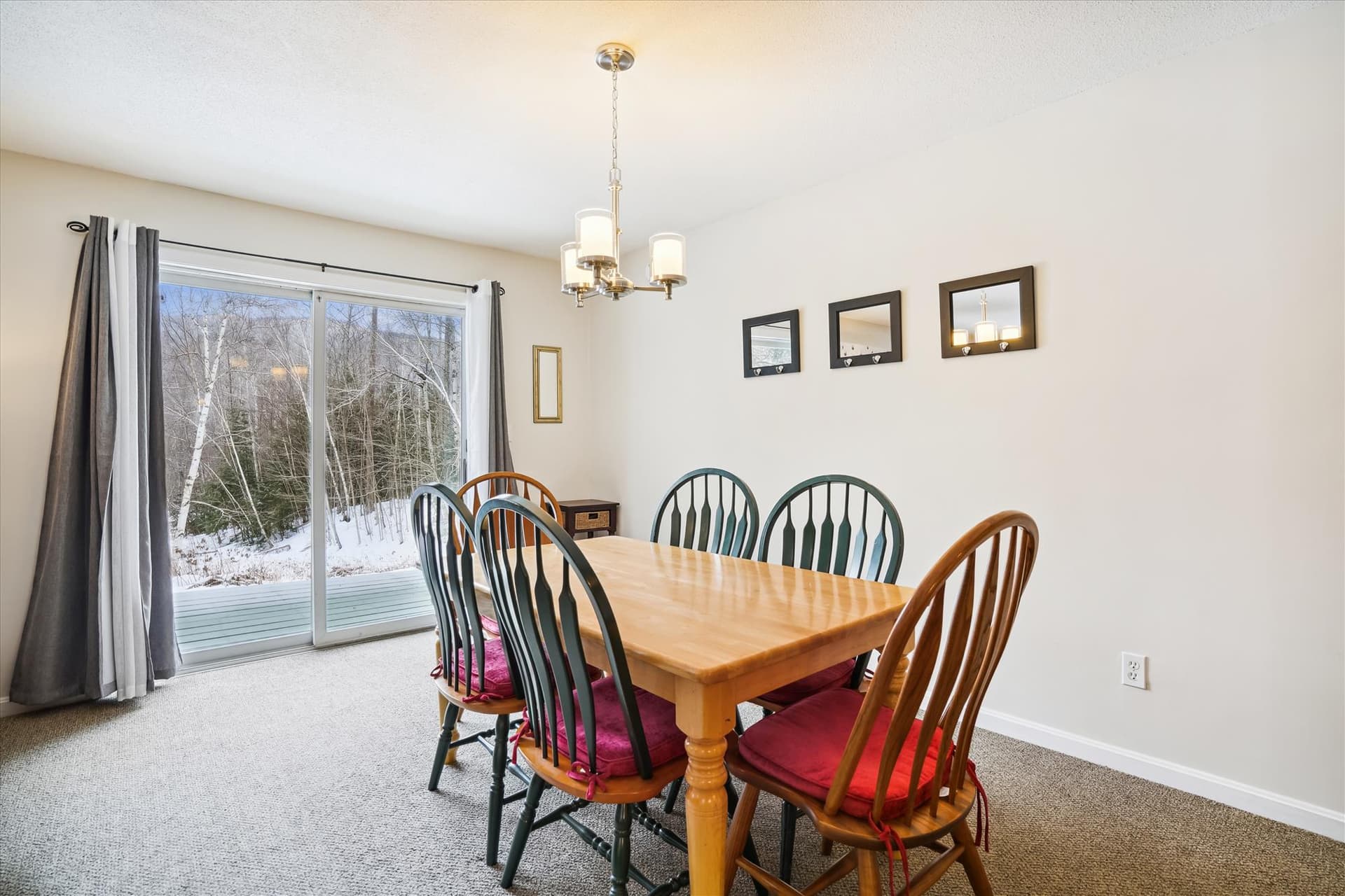Separate dining area seats up to six people with back yard views.