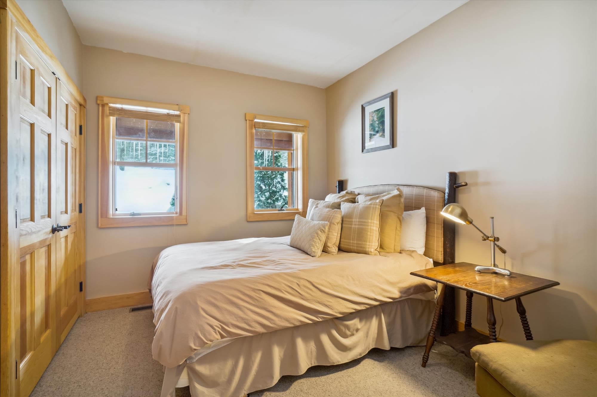 One of the queen beds with plenty of space.