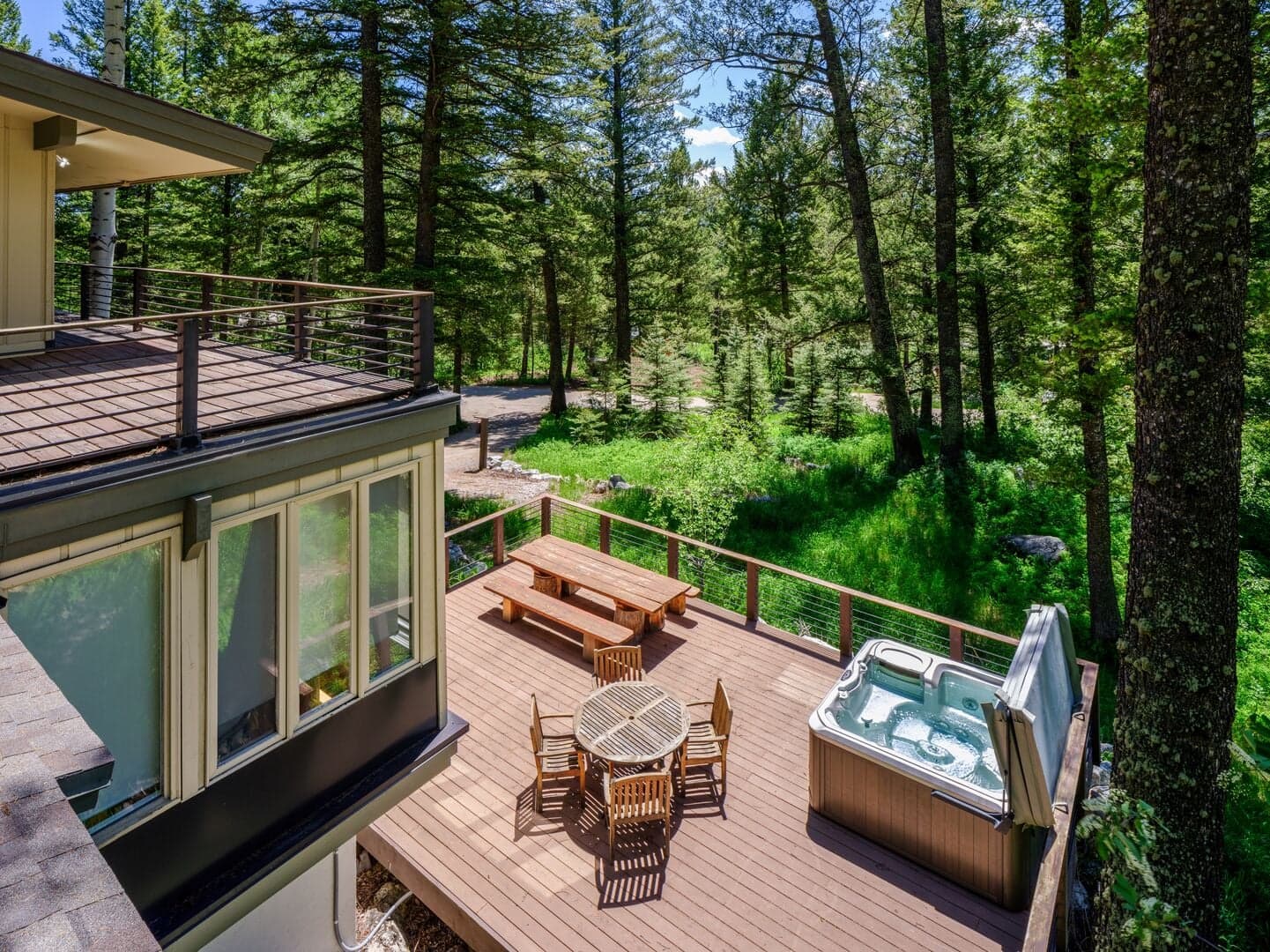 Lower Deck with Hot Tub and Dining Table