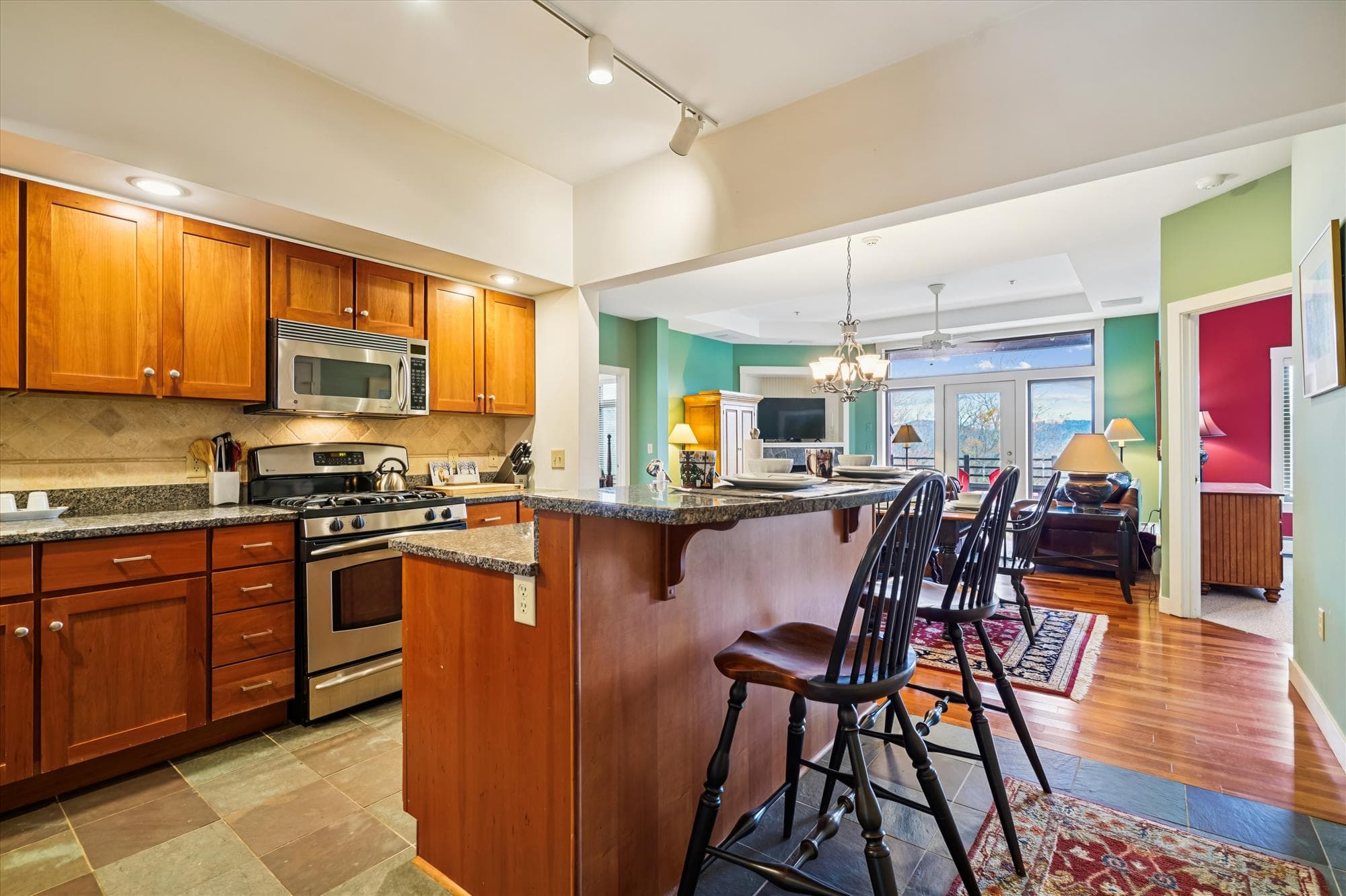 The dining area sits at the heart of the home, bridging the kitchen and living room with easy flow and beautiful natural light.