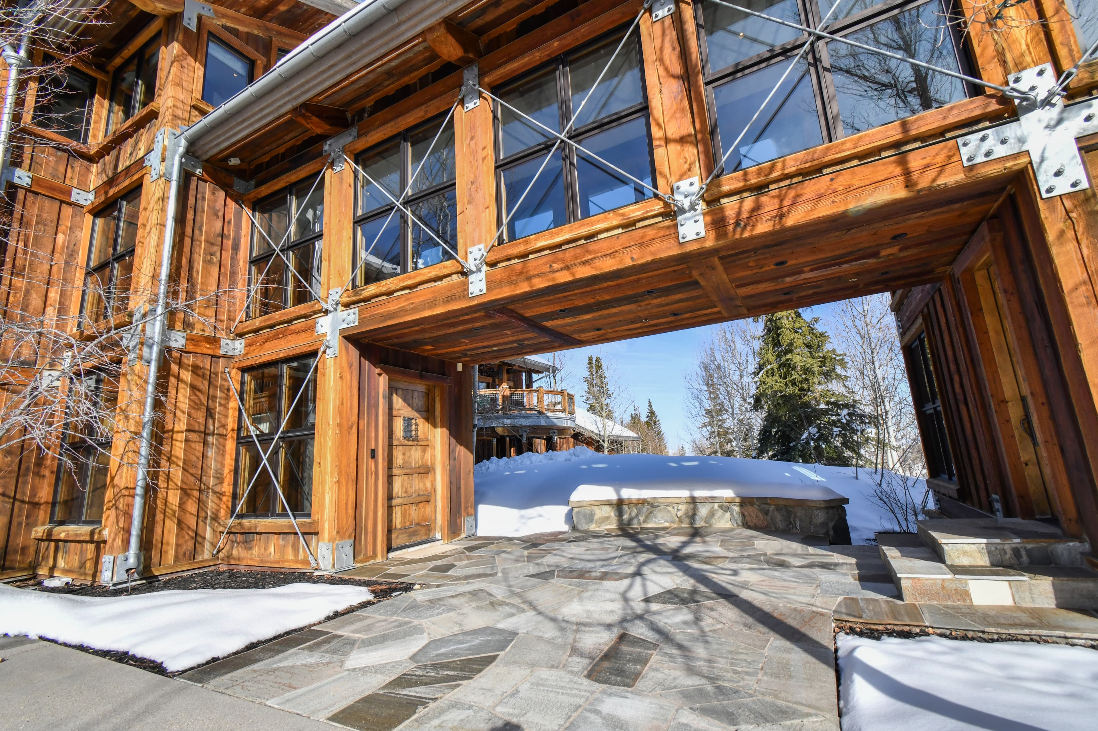 The windowed archway of the home, a bridge between two wings of the rental.