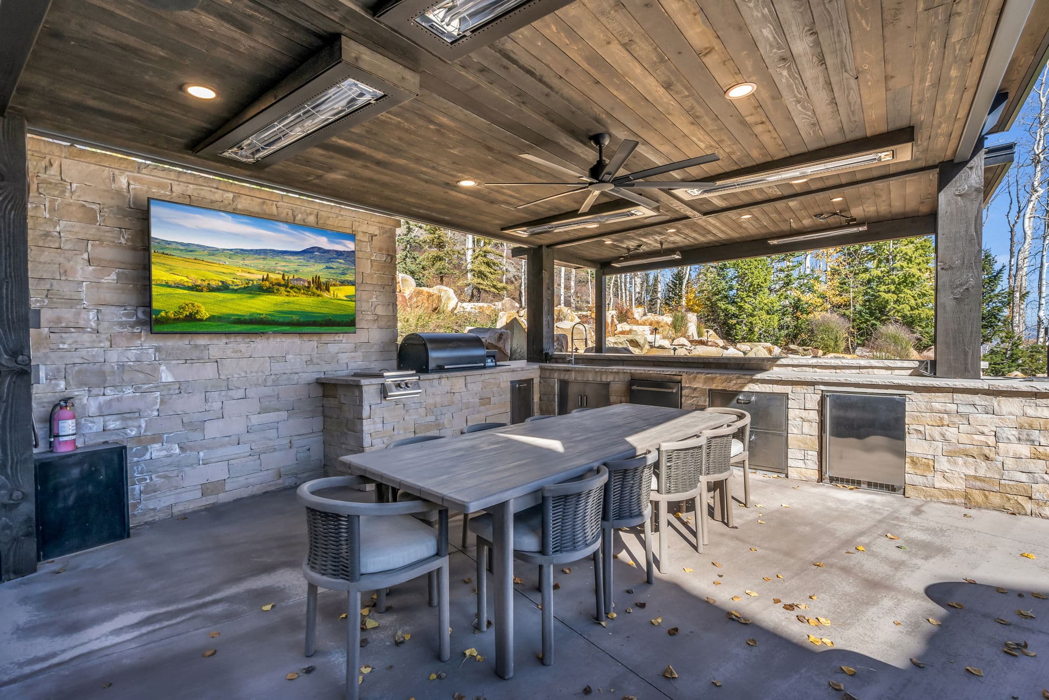 Outdoor Kitchen, Dining Table, Chairs, and TV