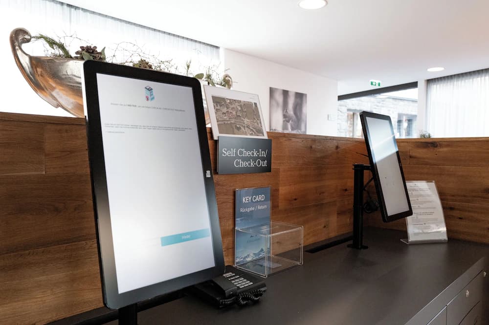 Check-in/check-out kiosk