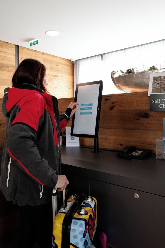 Check-in/check-out kiosk